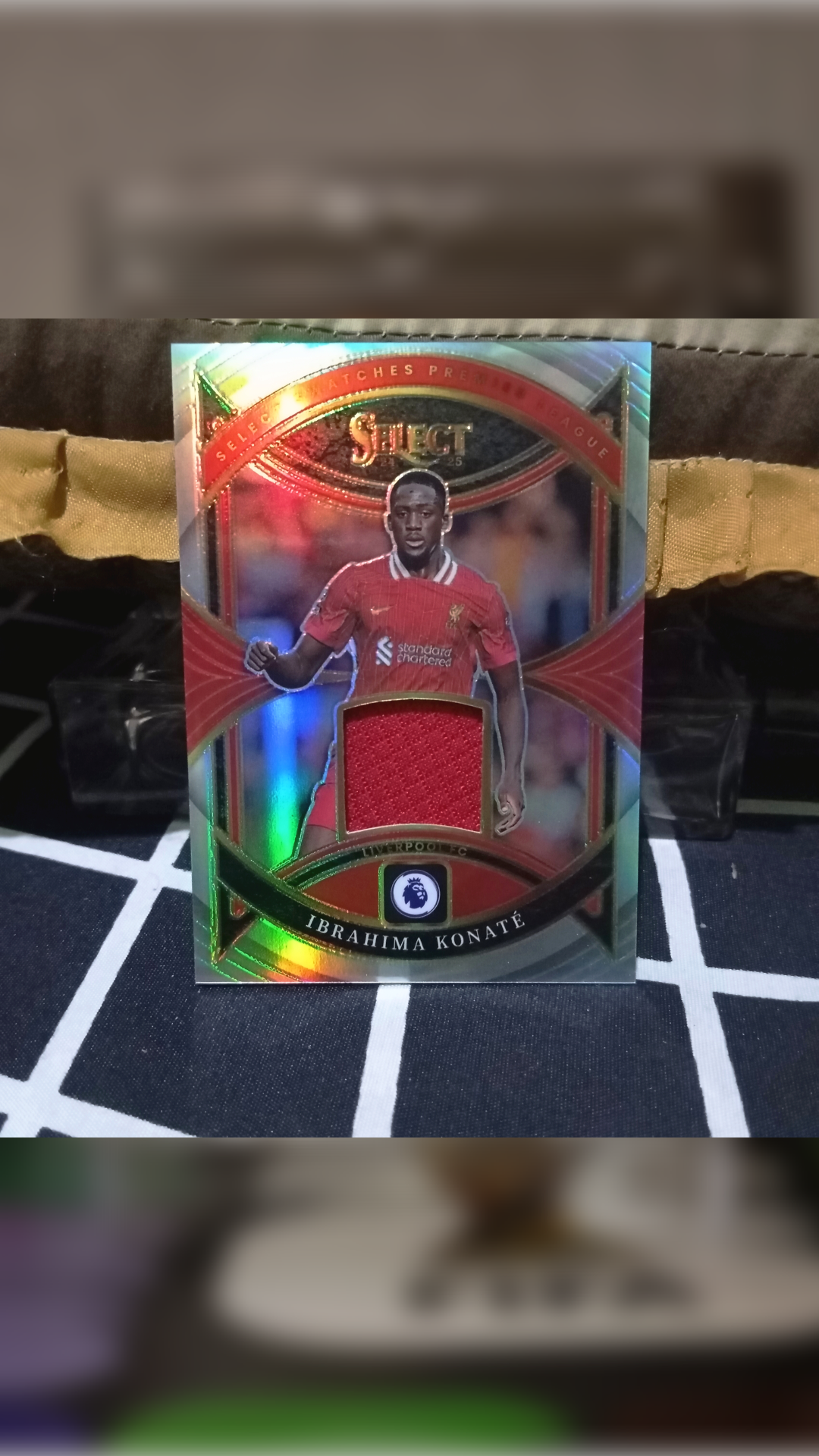 Kartu bola Panini Select Relic Ibrahima Konate
